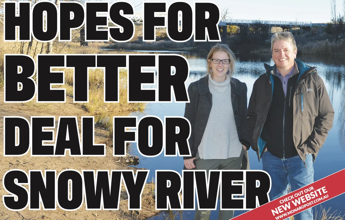 Isobel Bender on front page of The Monaro Post with Prof Jamie Pittock. The two stand together in wintery garments with the river in the background.