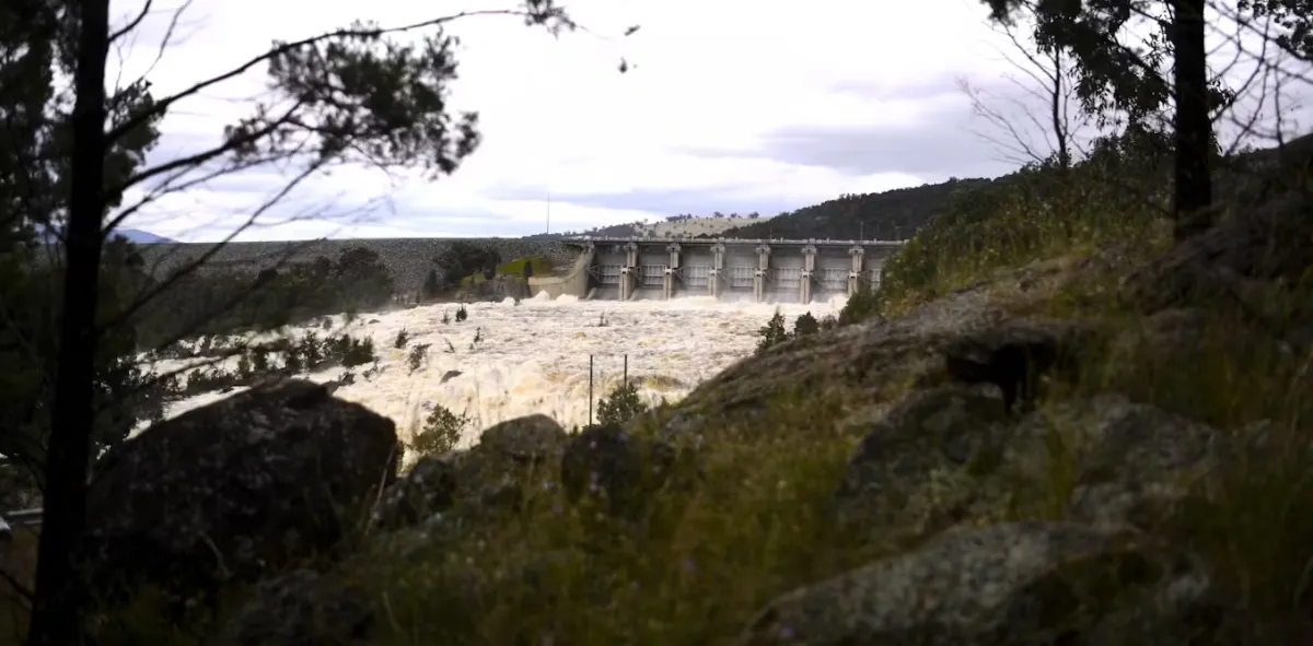 A dam overflowing.