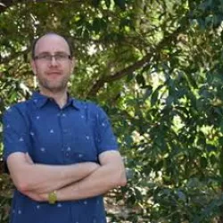 Nicolas Younes wears a blue shirt
