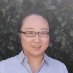Yuan Peng looks at the camera