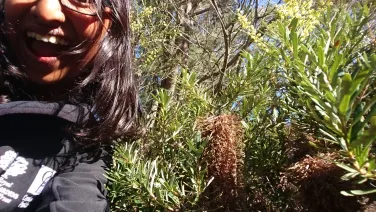Meena Sritharan with a rare plant
