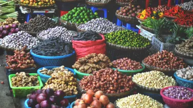 Bowls of fresh food at a market in Vietnam.